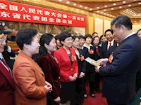 习近平等分别参加全国人大会议一些代表团审议